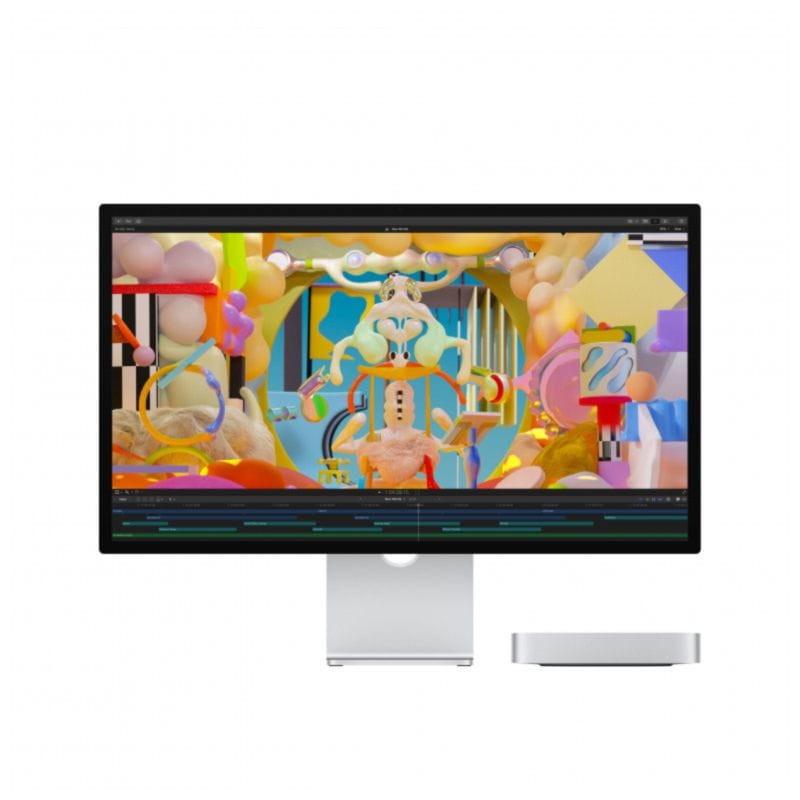 Vista frontal del Apple Mac Mini M2 Pro 16GB/512GB SSD/16 Núcleos GPU Plata junto a un monitor