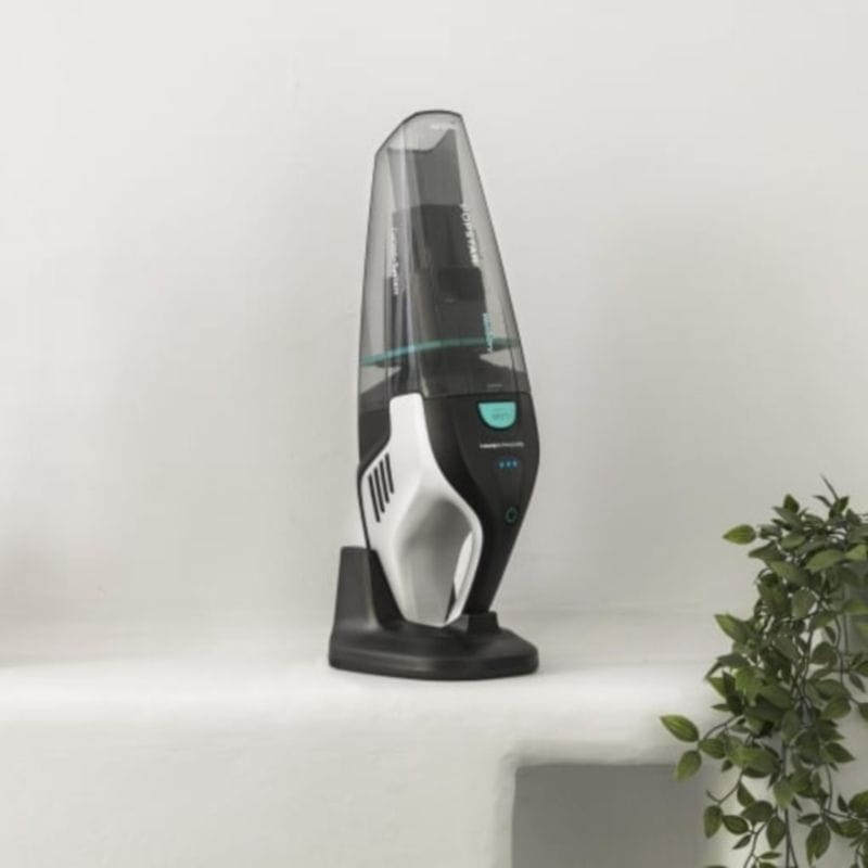 Aspirador Cecotec Popstar Micro na sua base de carregamento