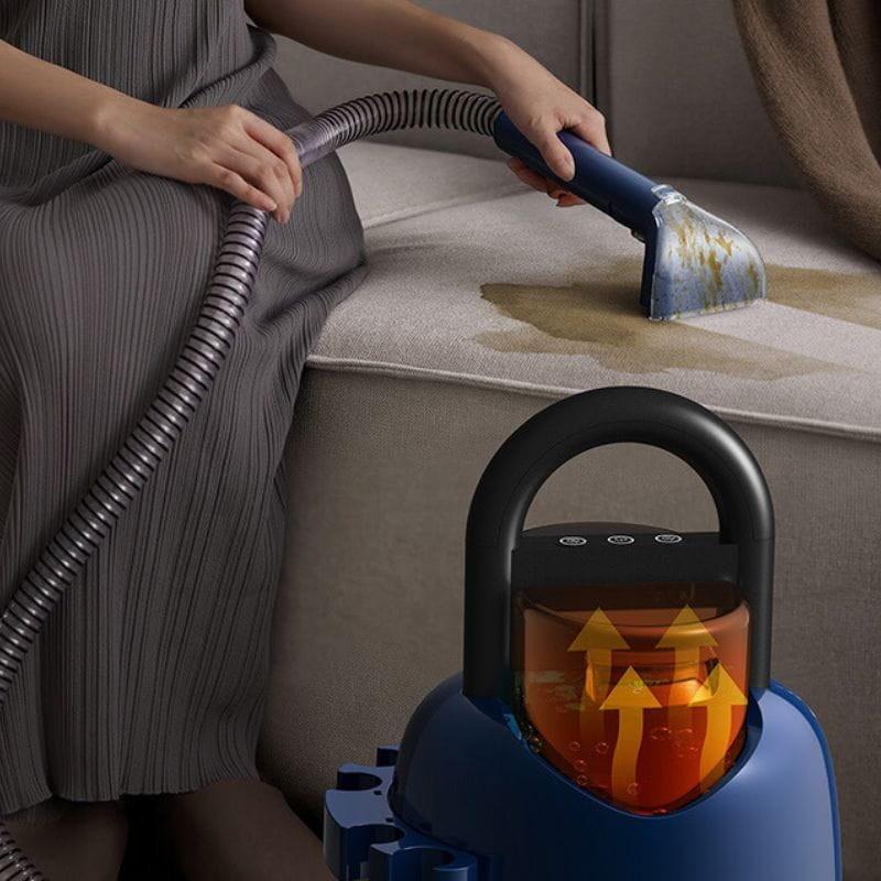 Deerma DEM-BY200 - Aspiradora de alfombra limpiando tapicería