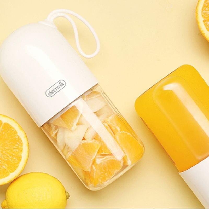 Deerma NU01 - Batidor portátil imagen imagen con naranjas