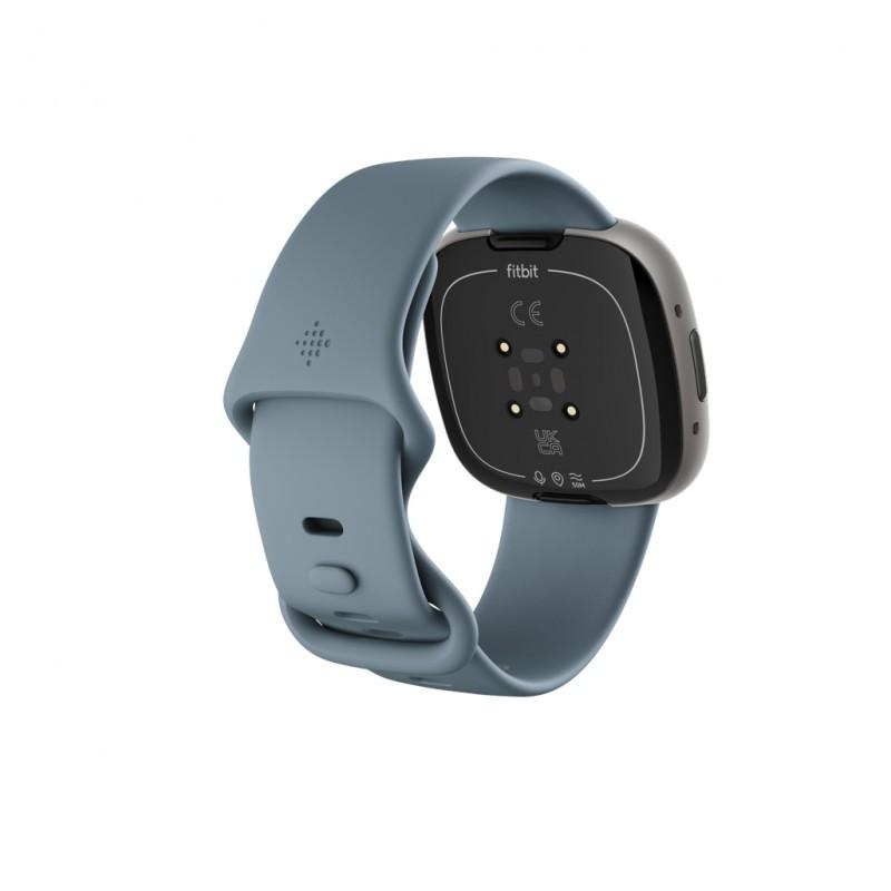Vue arrière et latérale gauche de la montre intelligente Fitbit Versa 4 Platine