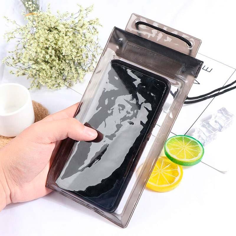 fotografía real de la Funda Móvil Impermeable Acuática Colgante Universal Púrpura