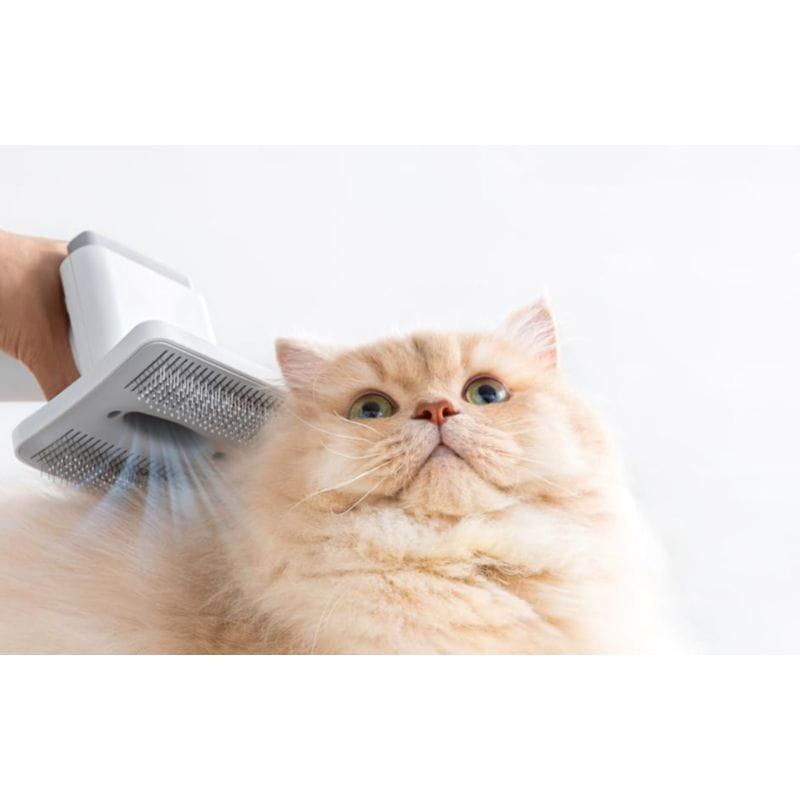 Aspiración del pelo de un gato con el Kit de aseo para mascotas HomeRunPet HC15