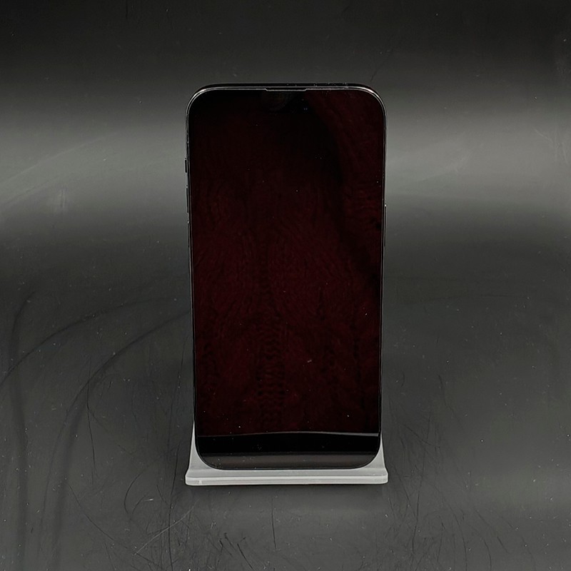 iPhone 14 Pro Max Negro Espacial, pantalla grande sin marcos, notch superior, cuerpo oscuro brillante, en soporte blanco. Estado premium, 128GB renovado.