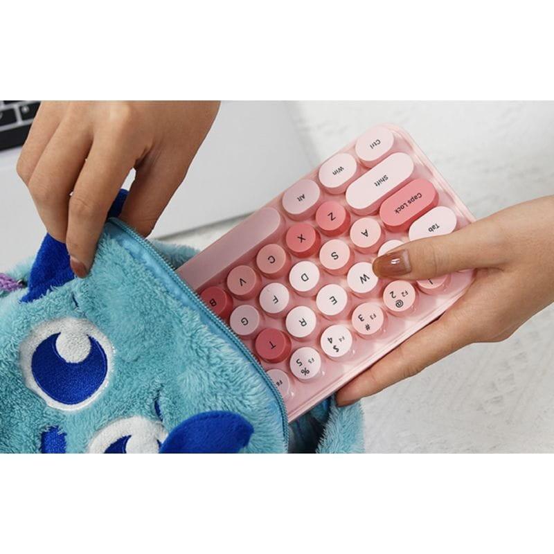 Design léger et pratique du MOFII Bean 2.4G Rose