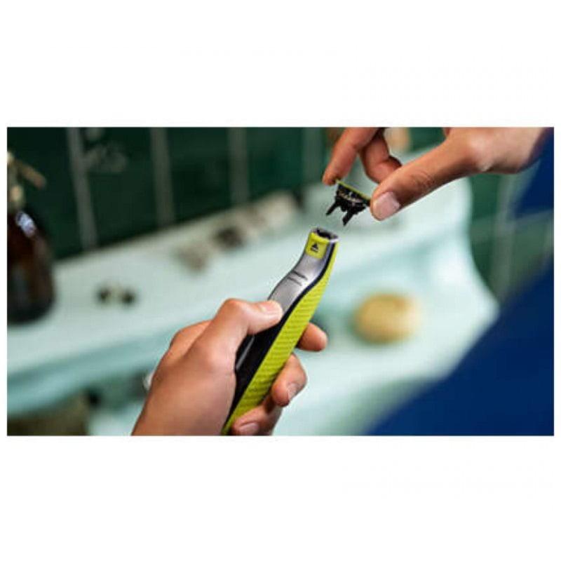 Détachement de la lame Philips QP410/50 de la poignée