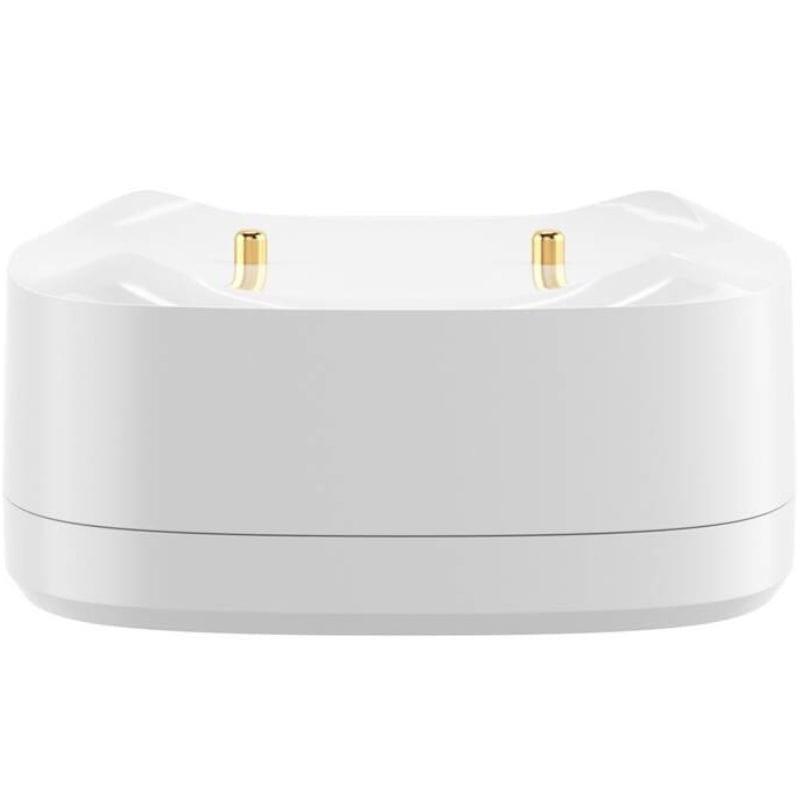 Base branca compacta com dois pinos metálicos dourados no topo; corpo oval em plástico liso. Componente do Sensor inteligente de fuga de água ZigBee SONOFF