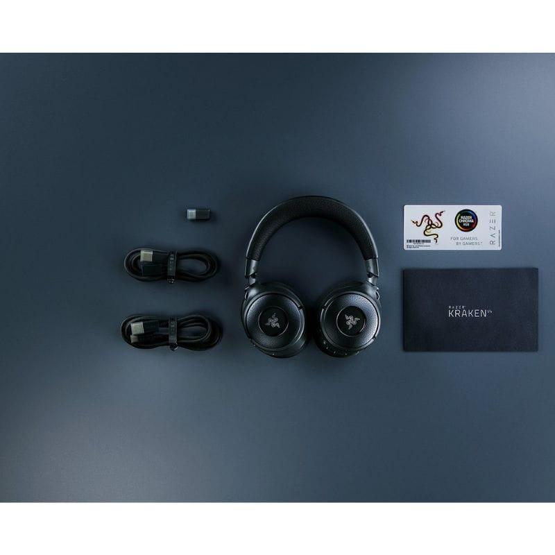 RAZER Kraken V4 – Casque gaming noir avec oreillettes rondes RGB, logo Razer central, arceau rembourré, design circum-aural moderne et lumineux.