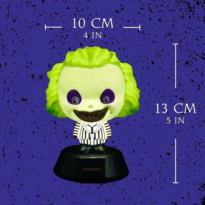 Lámpara Paladone Icon Beetlejuice: figura chibi con cabeza verde neón, ojos morados y traje a rayas, base negra; 13 cm de alto x 10 cm de ancho.