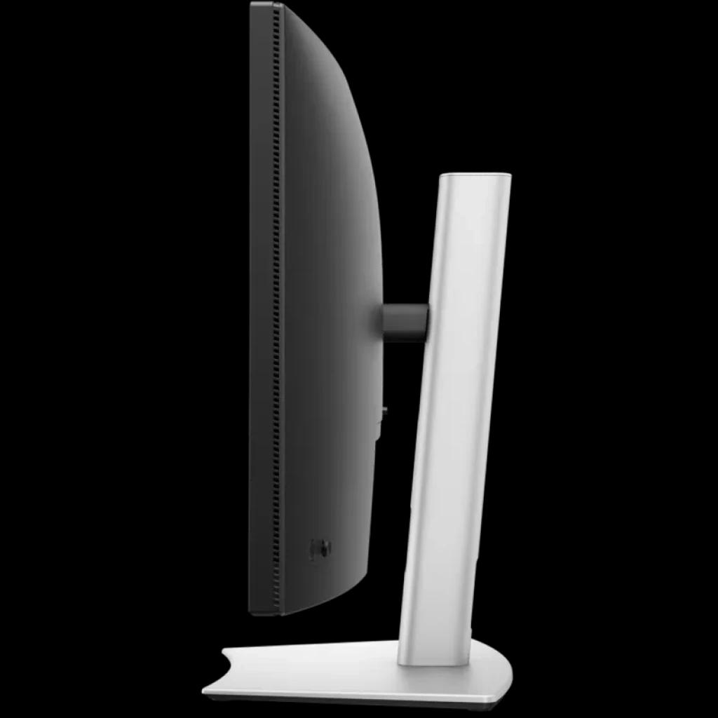 Monitor curvo preto visto de lado, tela ultrawide 34 polegadas, bordas finas, suporte robusto em cinza, perfil delgado com ventilação traseira