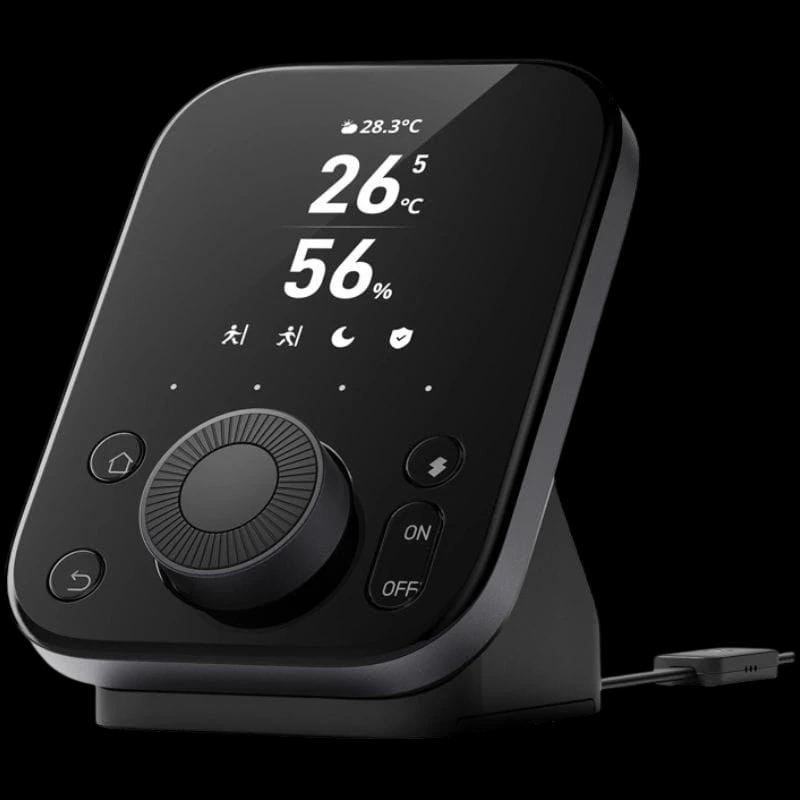 Centralita inteligente SwitchBot Hub 3 con pantalla negra brillante, dial central y botones táctiles ON/OFF; muestra temperatura, humedad e iconos de modos