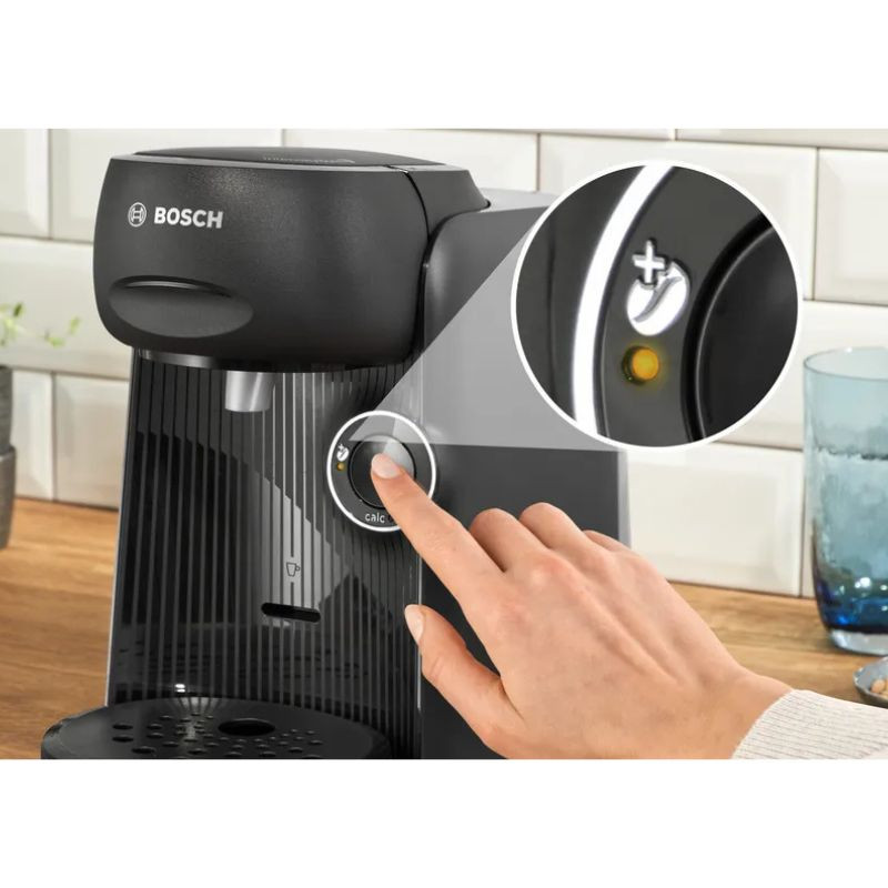 Bandeja antigoteo desmontable y ajustable de la Bosch Tassimo Finesse TAS16B2 en color negro, con rejilla perforada y base deslizante para distintas tazas
