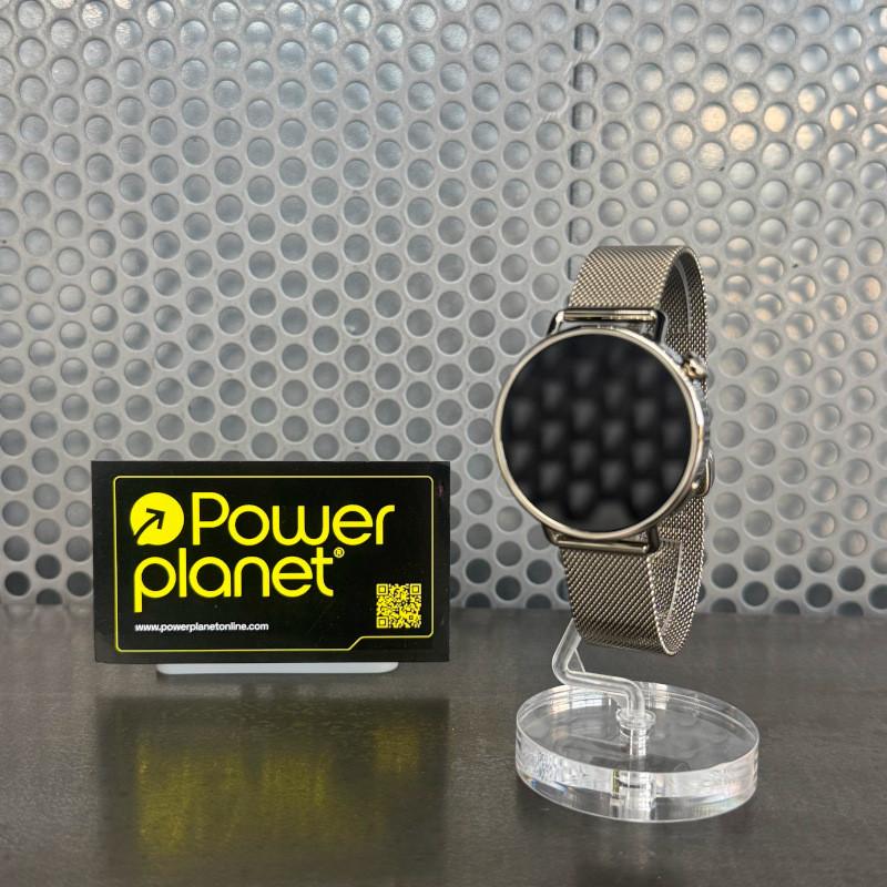 Xiaomi Watch S4 41mm Dorado con correa milanesa metálica en color oro, pantalla circular negra sin bisel visible, cuerpo fino y elegante en soporte