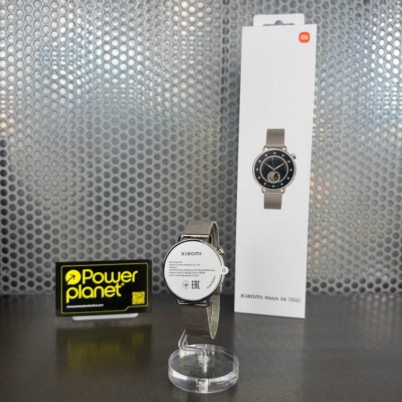 Xiaomi Watch S4 41mm dorado con correa milanesa de acero, pantalla circular minimalista, acabado elegante y caja delgada en exhibidor con su caja detrás