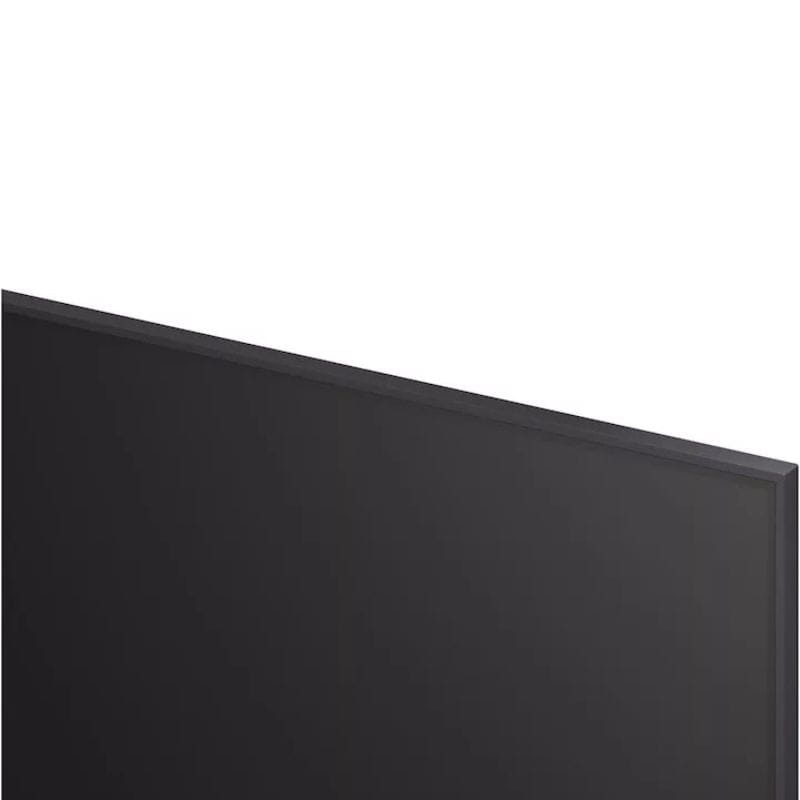 Parte trasera del LG 50UA74003LB: puertos HDMI laterales, ranura CI, USB, Ethernet, salida óptica y antena; diseño negro con rejilla de ventilación superior.