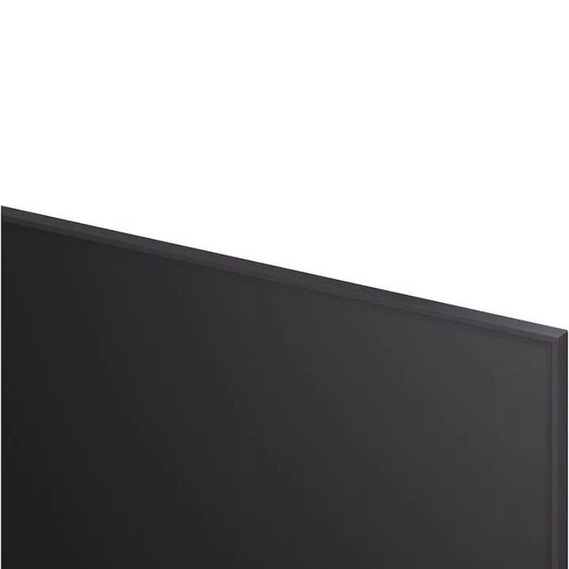 Parte trasera del LG 50UA74003LB: puertos HDMI laterales, ranura CI, USB, Ethernet, salida óptica y antena; diseño negro con rejilla de ventilación superior.