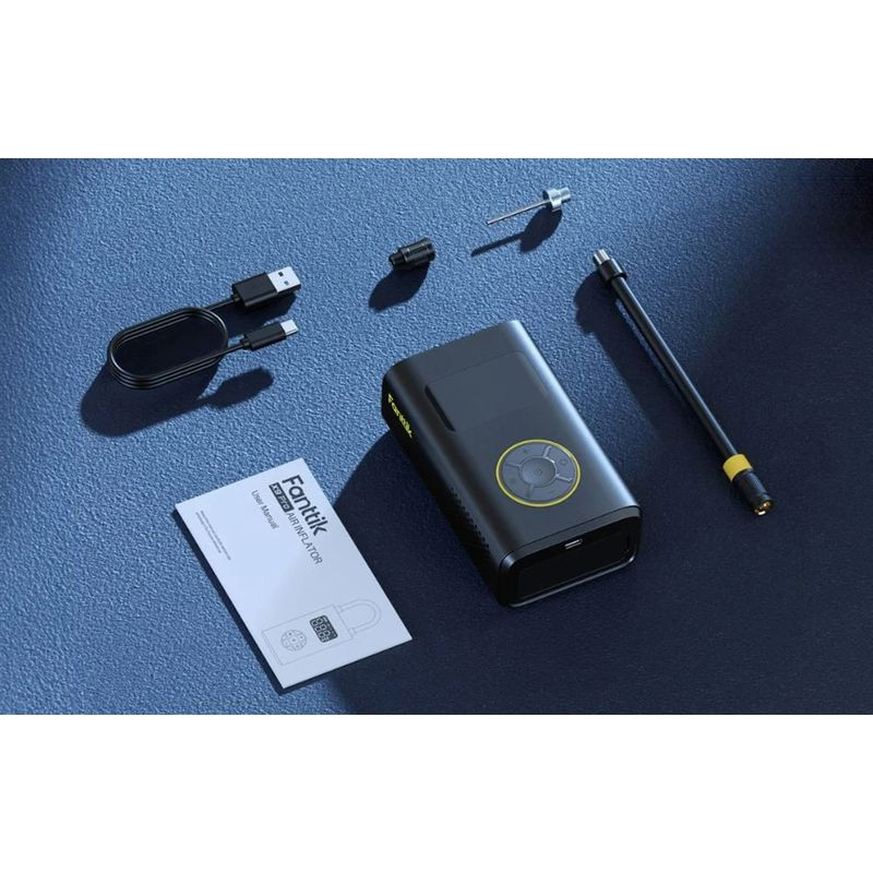 Fanttik X9 Pro Compresor Portátil negro con pantalla LED circular, botones frontales, manguera con acople, boquilla aguja, adaptador, cable USB y manual