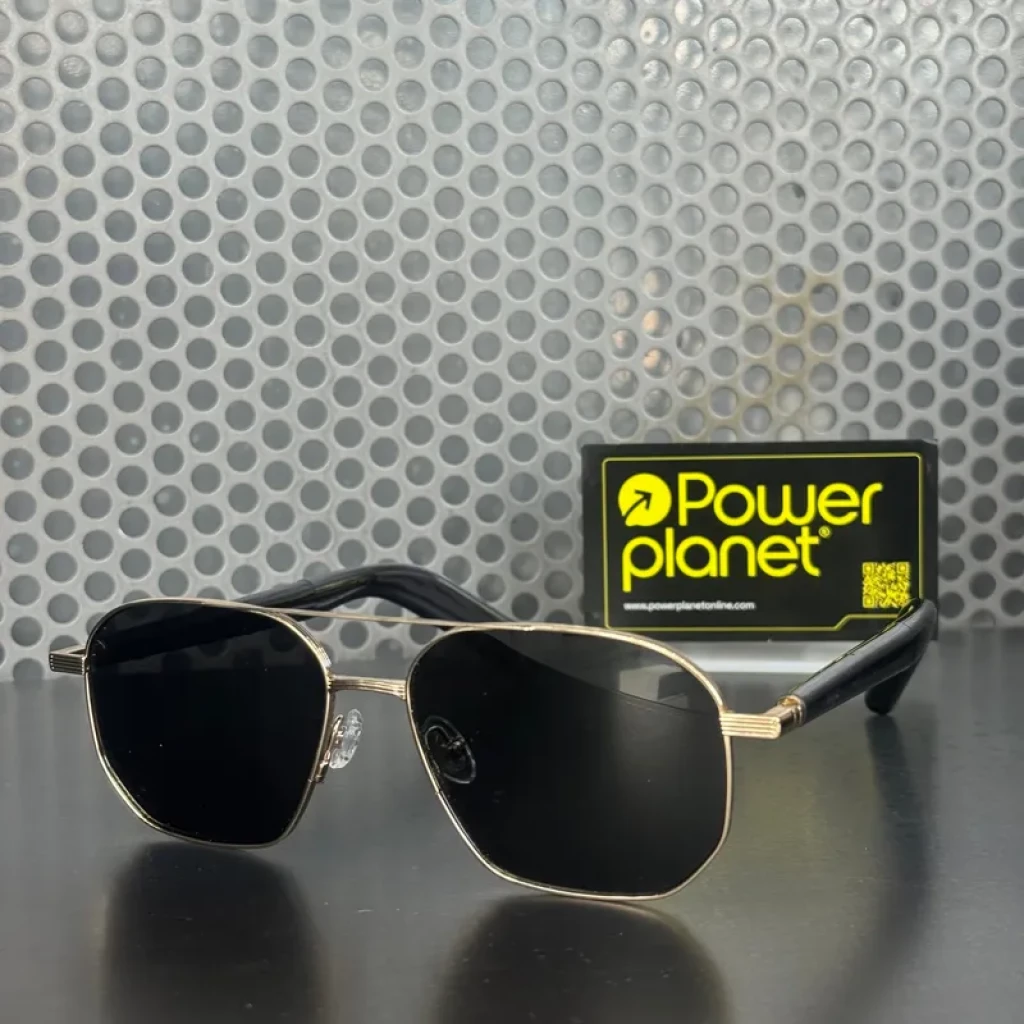 Mijia Smart Audio Glasses estilo piloto con montura metálica dorada, lentes negras rectangulares y patillas negras gruesas; diseño open-ear Bluetooth v5.4