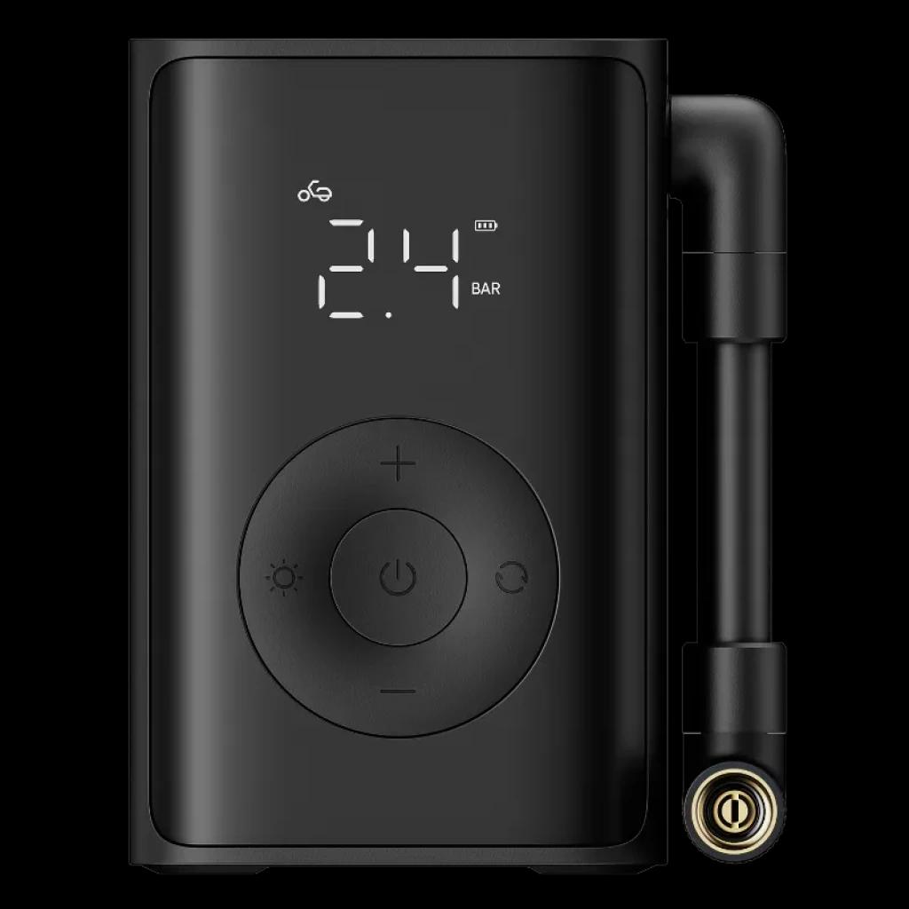 Compresor portátil negro Mijia con pantalla LED que muestra presión en BAR, botones circulares, manguera lateral con válvula metálica y linterna integrada