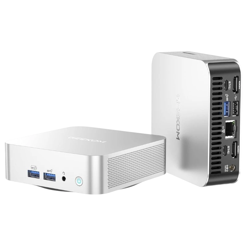 Mini PC argent GEEKOM A6 compact avec châssis aluminium, grilles latérales, ports USB frontaux, USB, HDMI, RJ45 et audio à l’arrière. Ryzen 7, 16 Go, 1