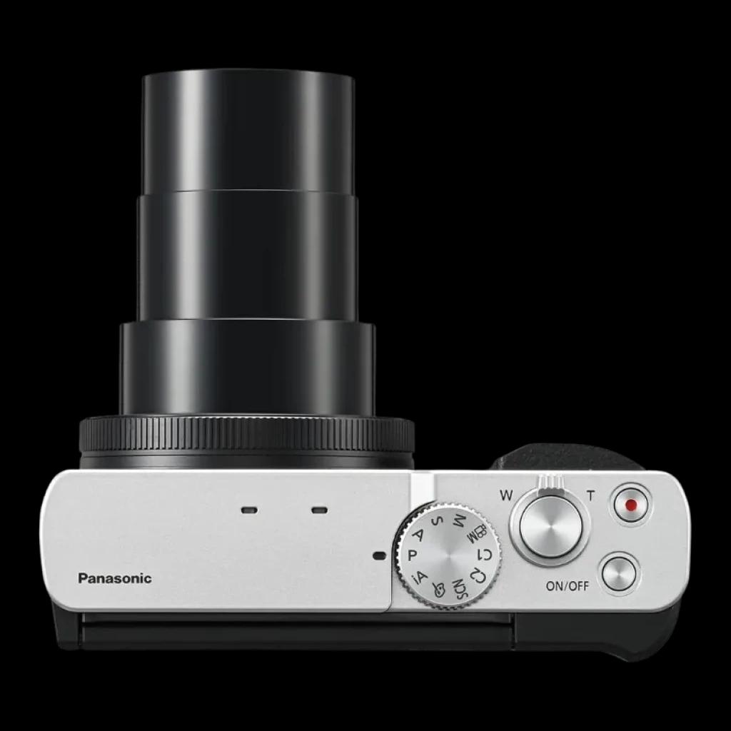 Panasonic Lumix TZ99 Argent avec boîtier argenté, zoom optique étendu, molette de sélection des modes, bouton d'enregistrement rouge et commande W/T sur le dessus