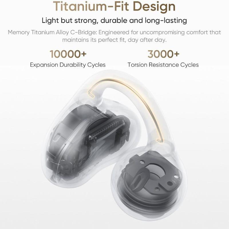 Clip OpenWear negro con arco de titanio C-Bridge, ligero y duradero. Diseño transparente muestra mecanismo interno. Orientado a reducción de ruido con IA.