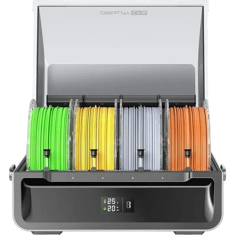Sistema de Gestión de Filamento Creality CFS con cuatro bobinas visibles en verde, amarillo, gris y naranja, tapa transparente y panel frontal con display