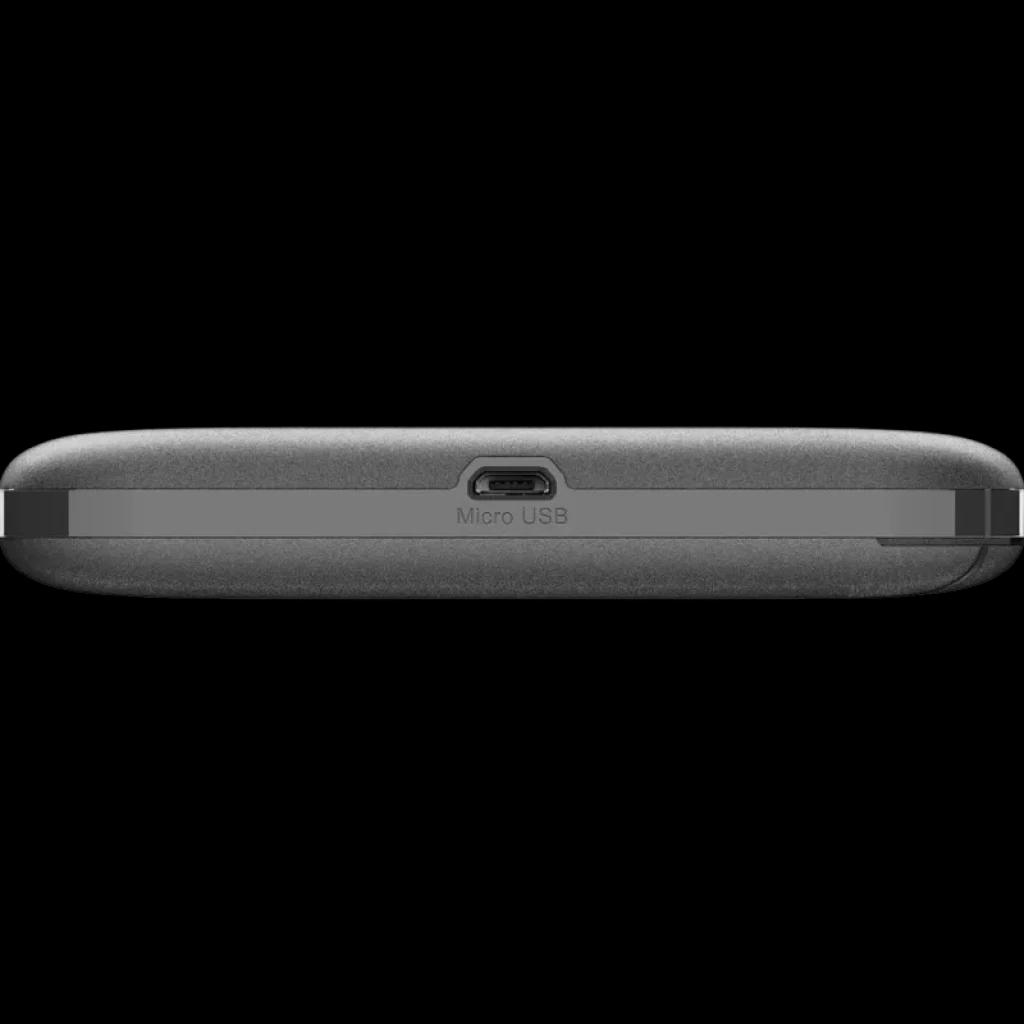 Vista inferior del D-Link DWR-932 con puerto Micro USB centrado, borde gris mate y diseño compacto portátil para router móvil 4G WiFi 2.4 GHz