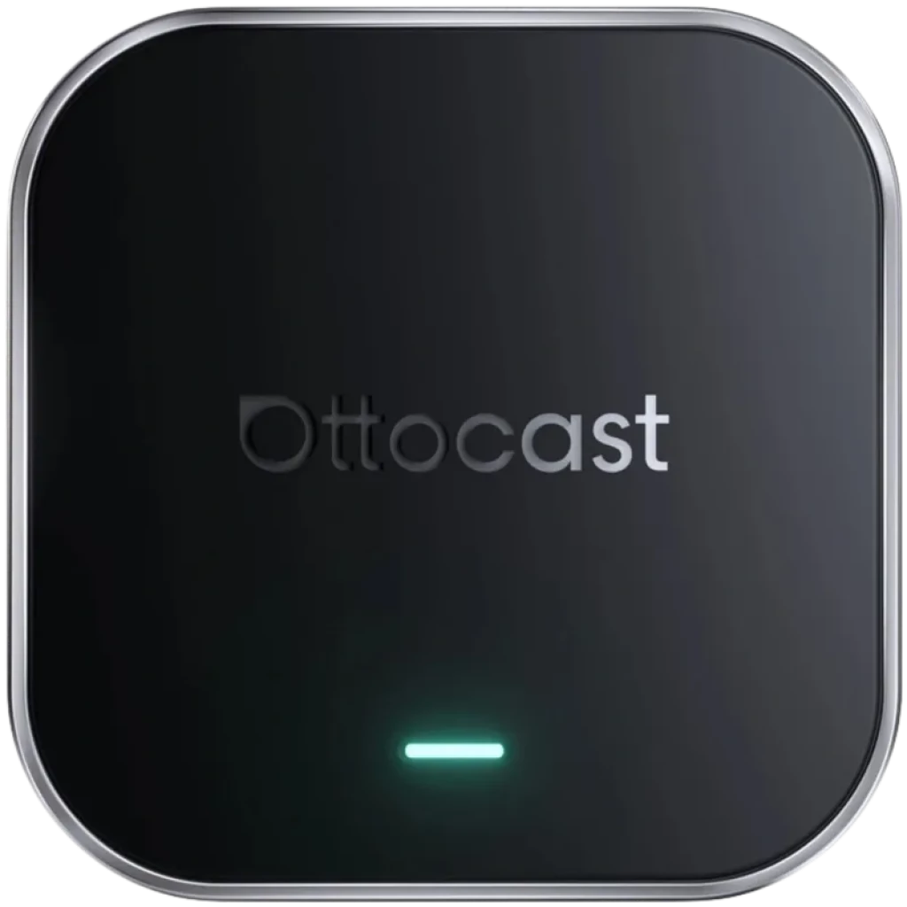 Adaptador AI Box compacto negro con bordes redondeados, acabado brillante, logo Ottocast al centro y luz LED verde indicadora en la parte inferior