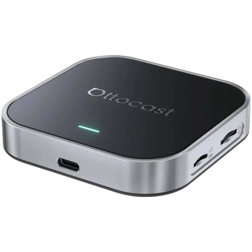 Ottocast OttoAibox E2 caja multimedia compacta negra con borde plateado, LED de estado verde, puerto USB-C frontal y ranuras laterales para tarjetas y USB