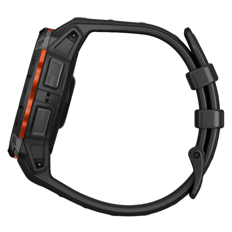 Garmin Instinct 3 45 mm Solar negro con correa de silicona negra; vista lateral con botones texturizados y aro naranja, diseño robusto GPS multibanda