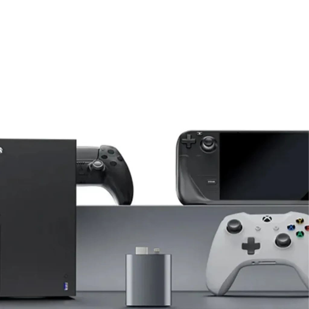 Adaptador HDMI a USB-C compacto en gris, con puerto USB-C superior; ideal para cargar gafas AR RayNeo. Compatible con consolas y mandos cercanos.