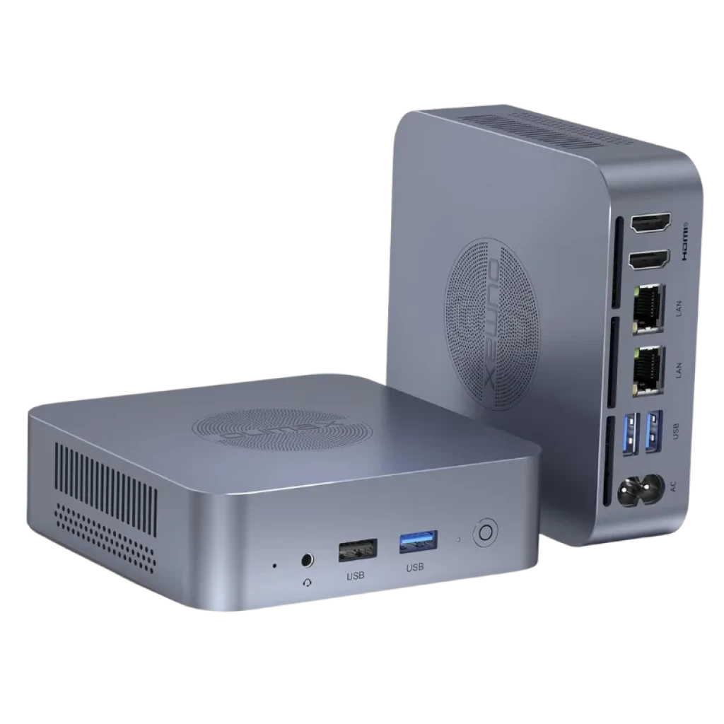 Oumax MAX N100 gris métallisé avec grilles latérales, ports USB et audio à l'avant, et panneau arrière avec HDMI, double LAN, ports USB supplémentaires et alimentation