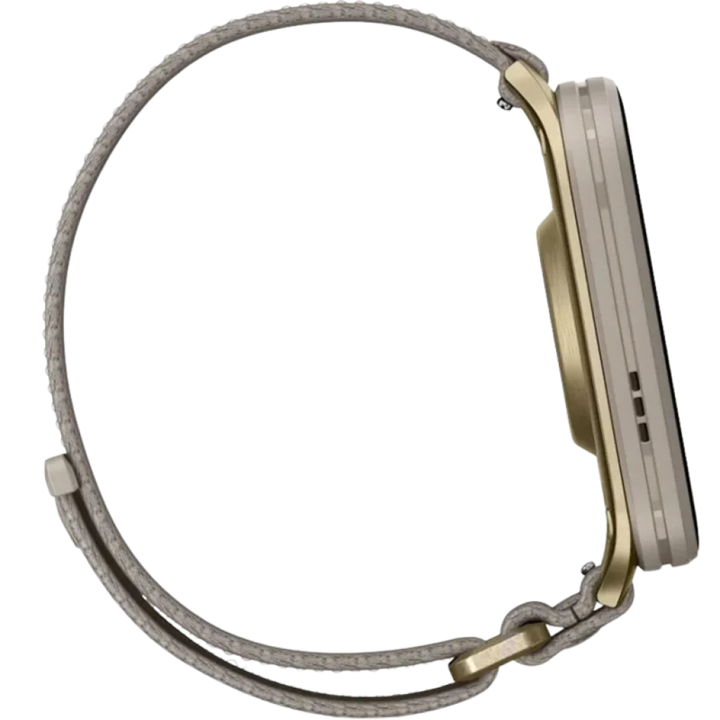 Garmin Venu X1 con caja de titanio dorada y correa de nailon ComfortFit gris; perfil delgado, hebilla metálica y diseño ligero y elegante