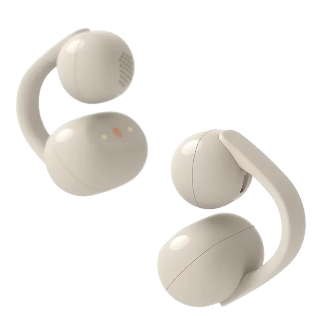Auricular bege open-ear com design em clipe, cápsulas arredondadas e microperfurações. Indicadores LED visíveis e acabamento fosco elegante.