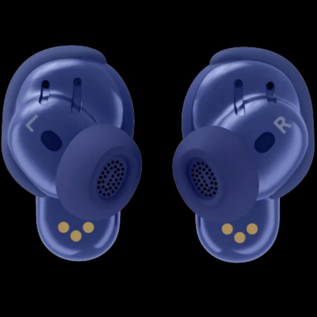 Auriculares intra-auriculares roxos com ponteiras de silicone, grelha frontal preta e contactos de carregamento dourados, marcados L e R, design compacto