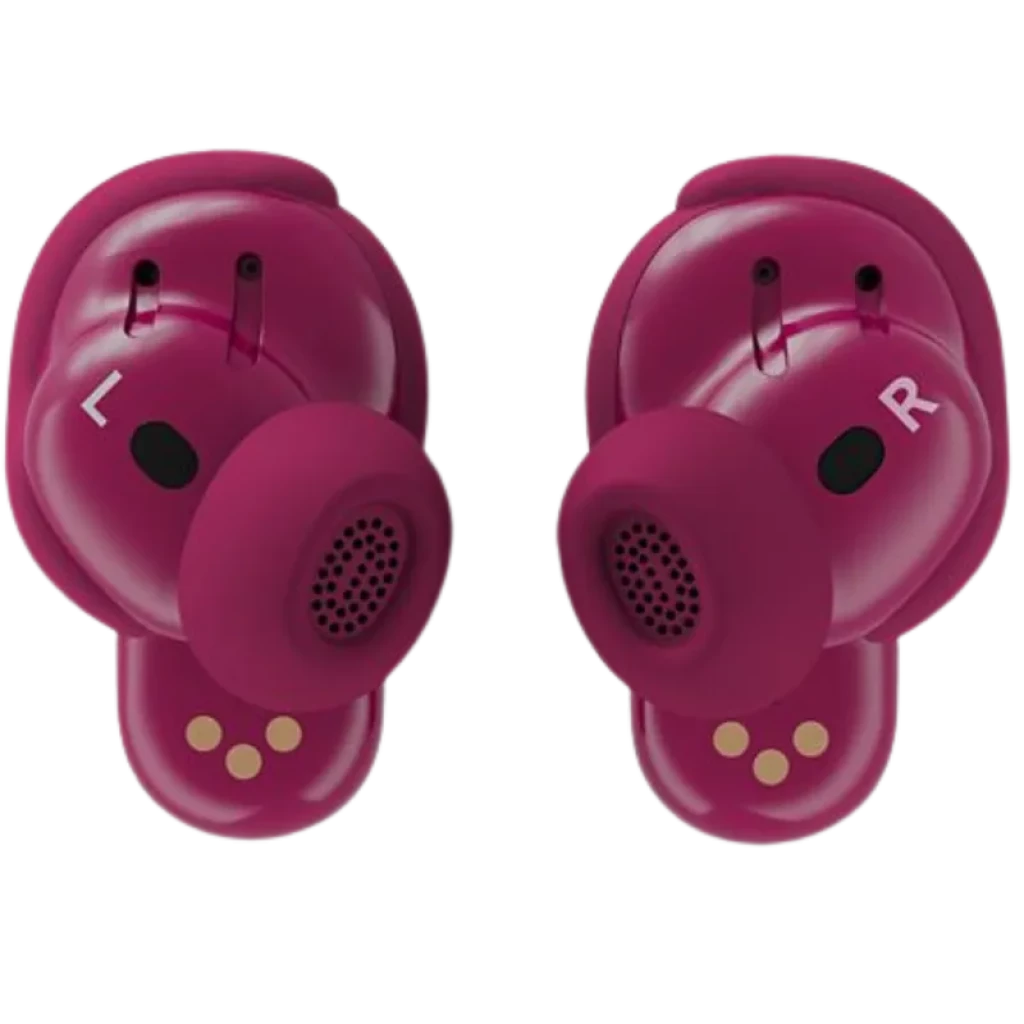 Écouteurs intra-auriculaires rose prune avec embouts arrondis, évents audio visibles, marquages L et R, contacts de charge dorés, design compact et