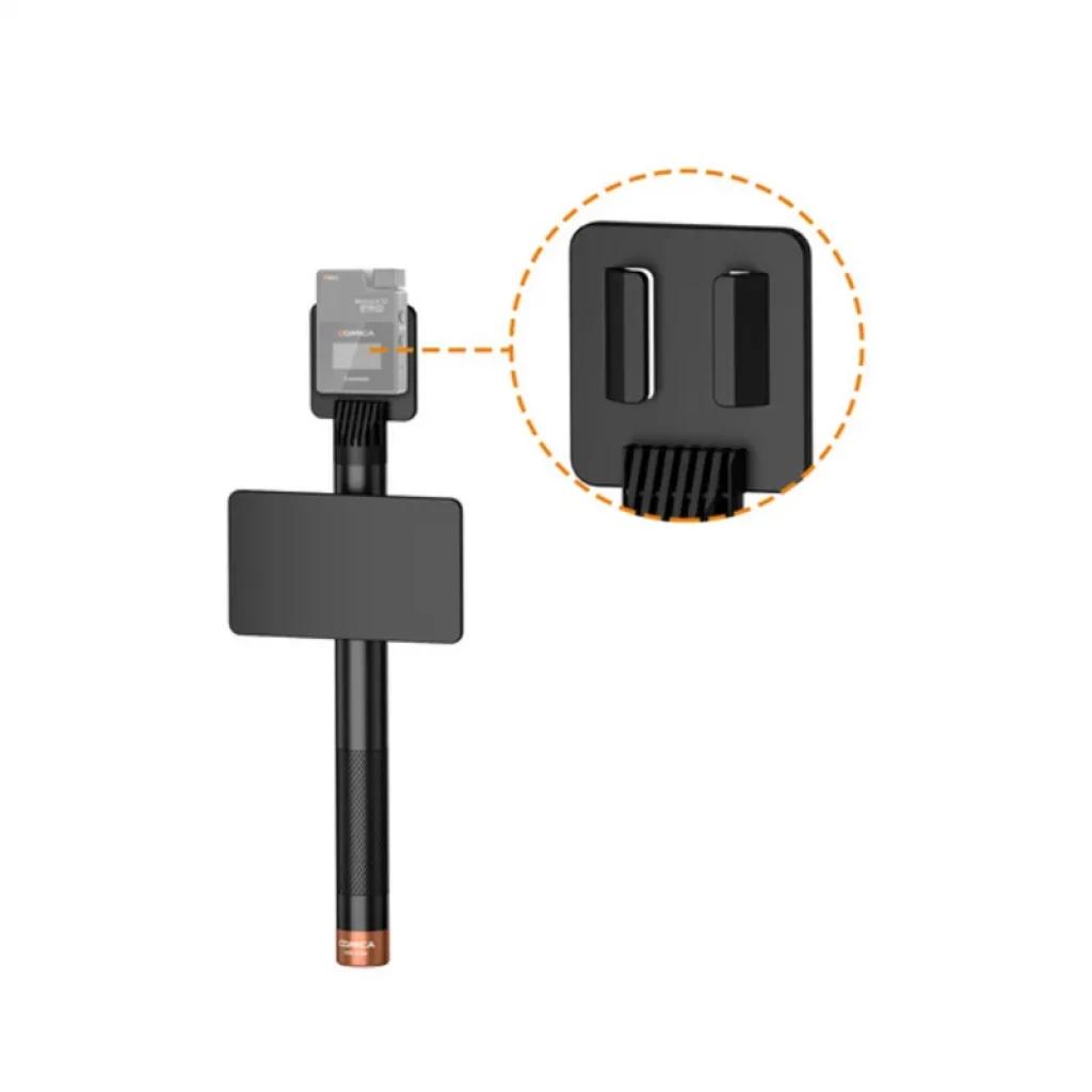 Comica HR-WM transmisor UHF de mano con cápsula supercardioide, cuerpo negro texturizado, anillo cobrizo, pantalla y clip doble mostrados en detalle