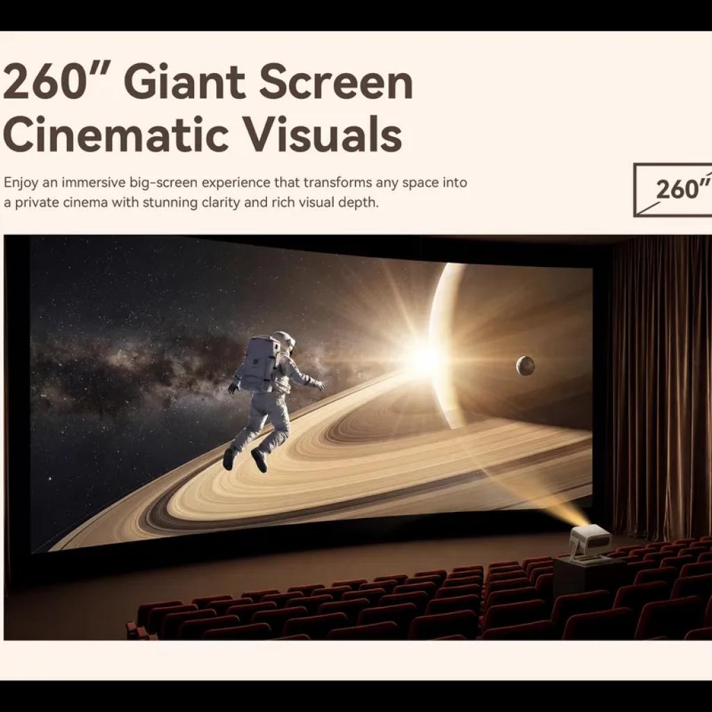 Pantalla gigante de 260 pulgadas proyectada en sala de cine; proyector portátil en mesa muestra astronauta y planeta con anillos en imagen nítida y vibrante