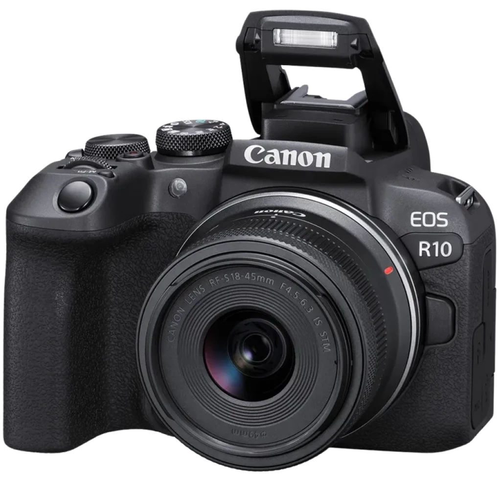 Cámara mirrorless Canon EOS R10 negra con flash emergente, lente RF-S 18-45mm IS STM, cuerpo compacto con agarre texturizado y dial superior