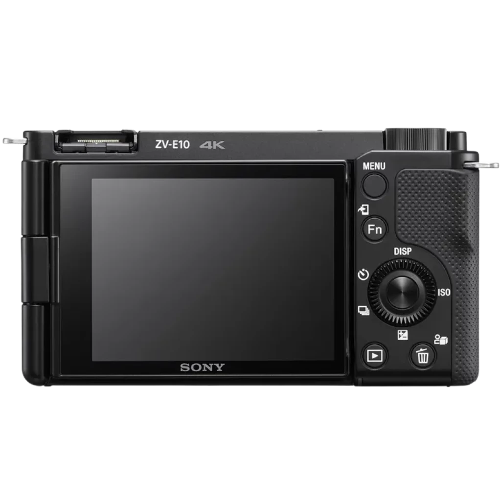 Parte trasera de la Sony ZV-E10 con pantalla LCD abatible, controles laterales, dial de selección, botón de grabación, empuñadura texturizada y puerto hot
