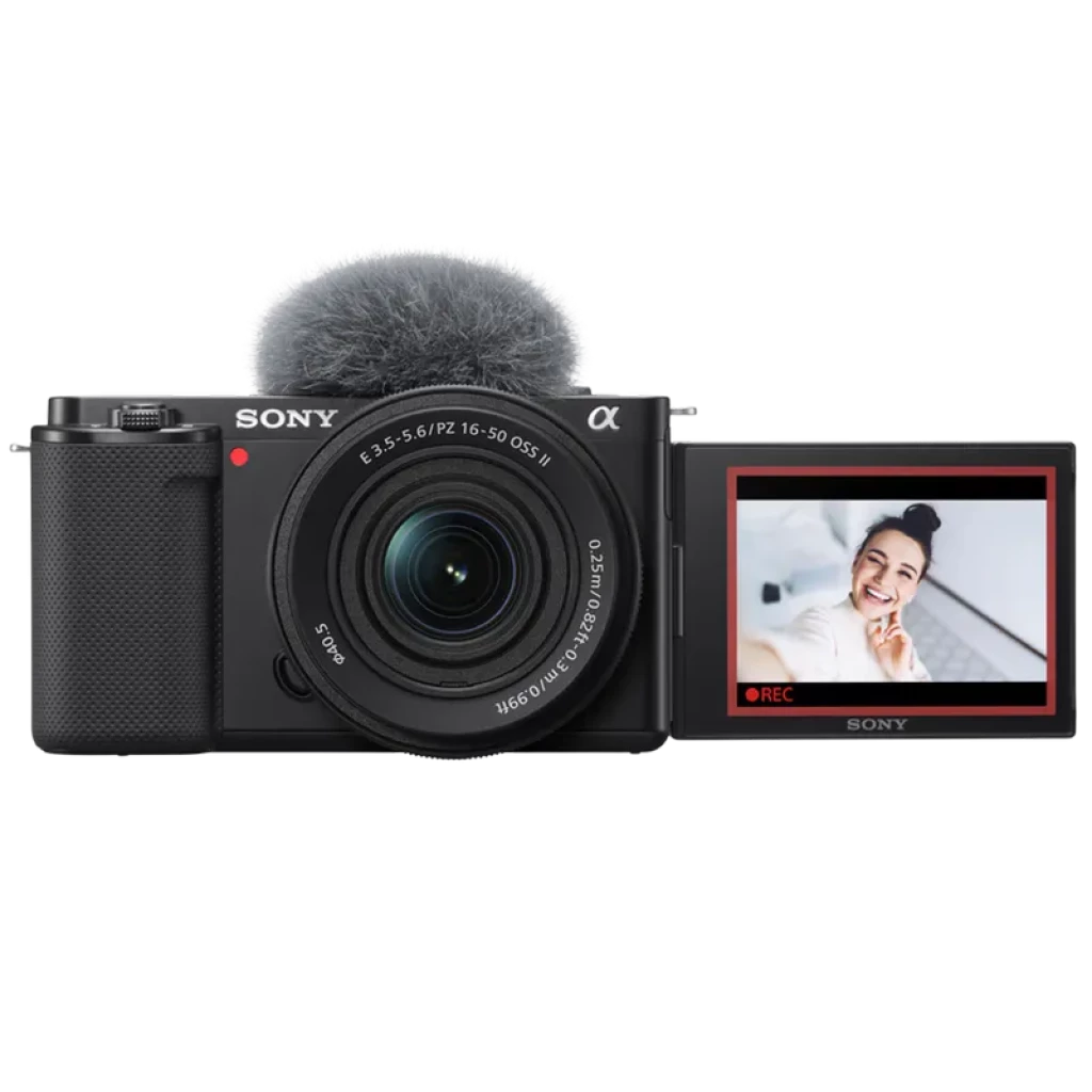 Sony ZV-E10 con lente E PZ 16-50mm OSS II, pantalla lateral abatible, micrófono superior con parabrisas, cuerpo compacto negro para vlogging