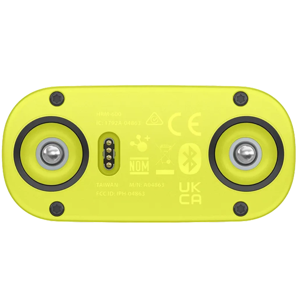 Módulo trasero amarillo del Garmin HRM 600 XS-S con contactos metálicos simétricos, sello de goma perimetral y logotipos de certificación y Bluetooth