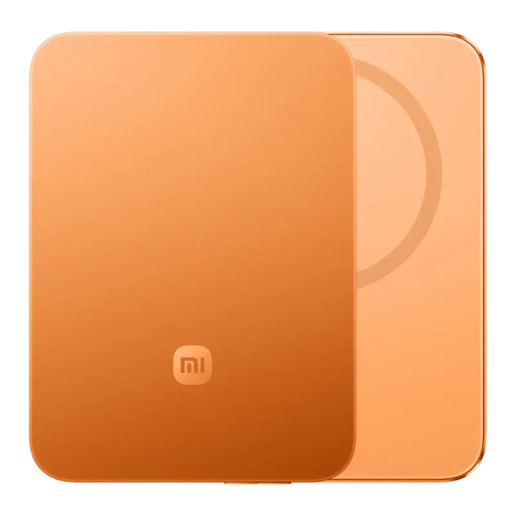 Power bank magnético ultradelgado naranja con acabado mate, anillo MagSafe visible, bordes redondeados y logo mi al frente