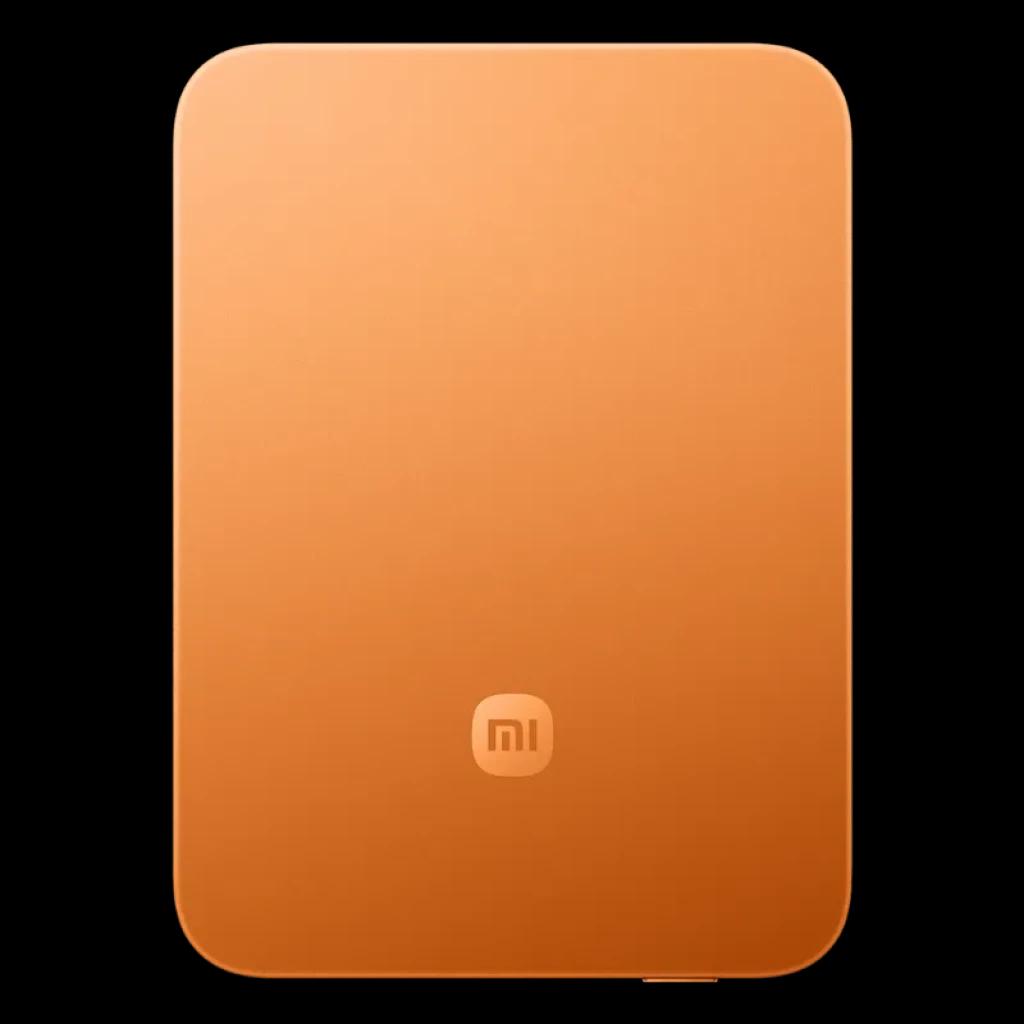 Power bank magnético ultrafino naranja con logo Mi centrado, bordes redondeados y acabado mate