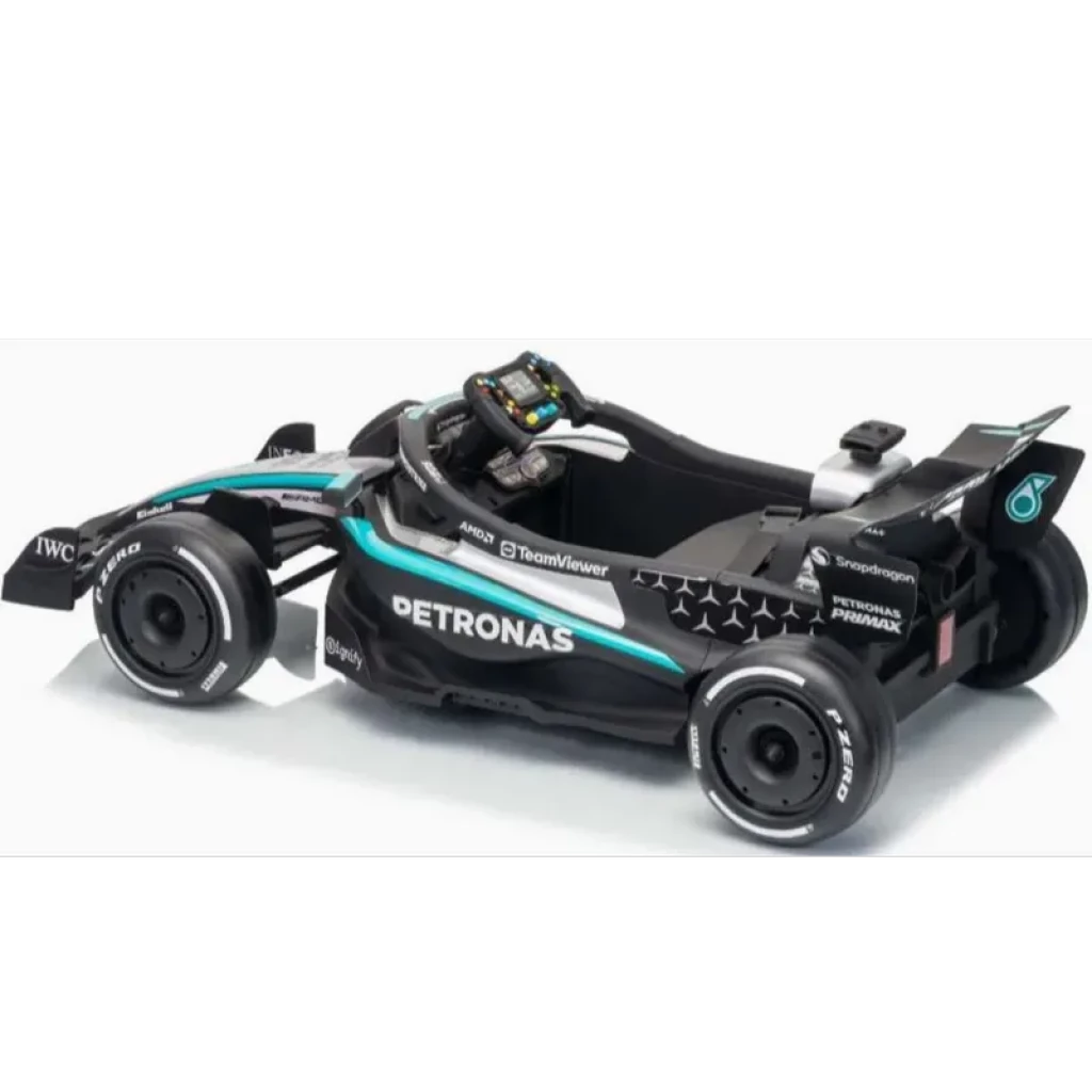 Coche eléctrico infantil estilo F1 Mercedes-AMG Petronas 12V en negro con detalles turquesa y plateados, alerón trasero, volante con botones y llantas