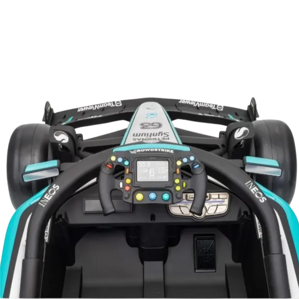 Cockpit de coche infantil Mercedes-AMG Petronas F1 12V con volante multifunción, display central, botones de control y detalles en negro y turquesa