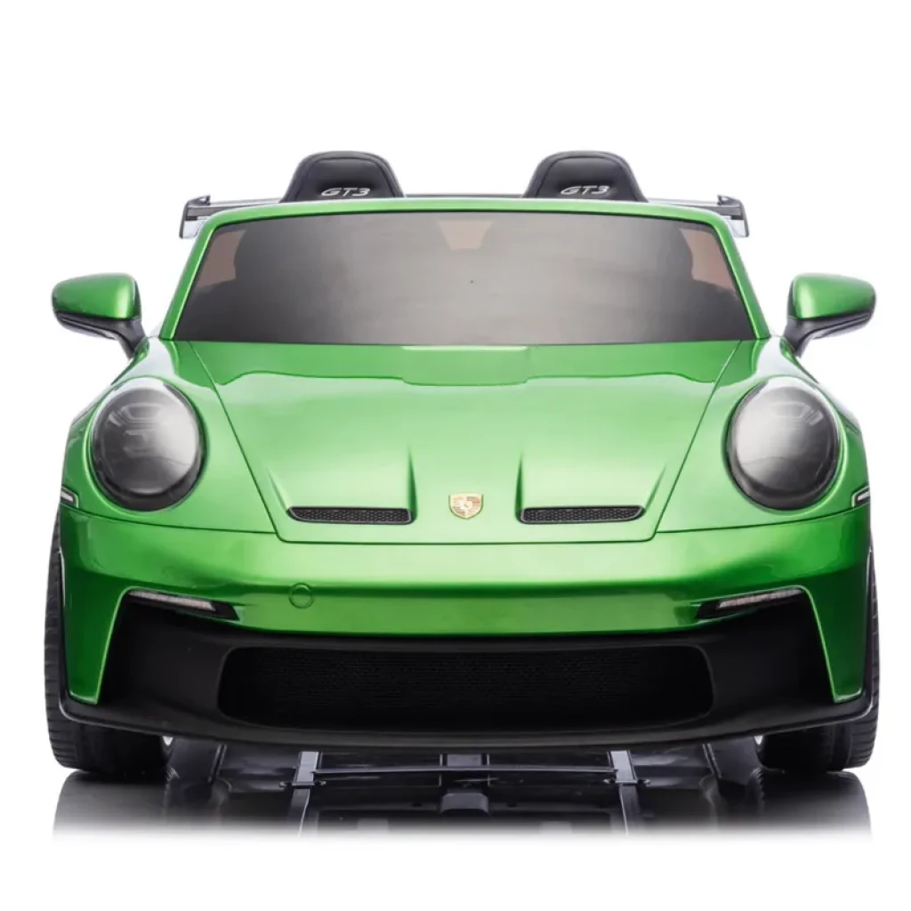 Porsche 911 GT3 infantil 12V en verde metálico, frontal deportivo con faros LED, parrilla ancha y asientos dobles GT3; batería 10Ah para mayor autonomía