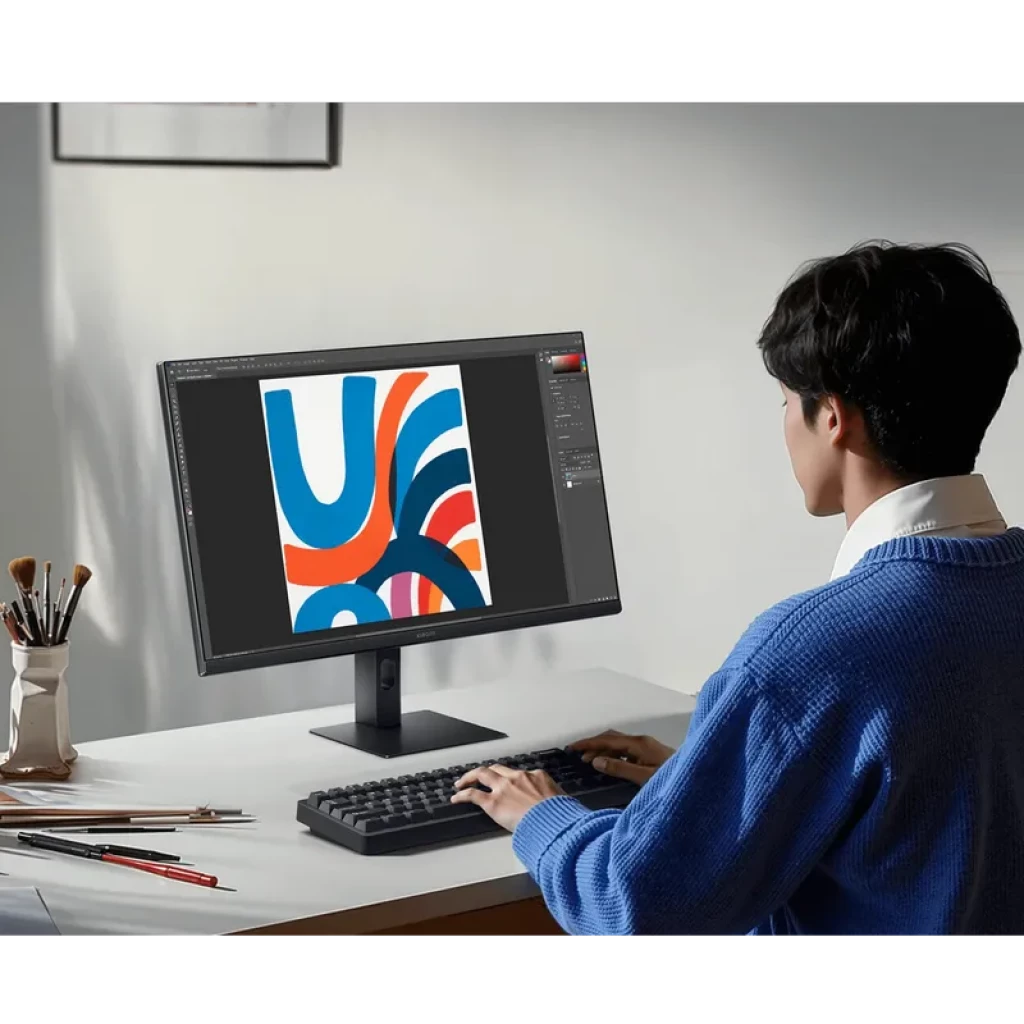 Xiaomi Monitor A27i 2026, panel IPS 27 pulgadas FHD, 144Hz, marcos delgados, soporte ajustable, colores vivos en escritorio moderno con teclado compacto