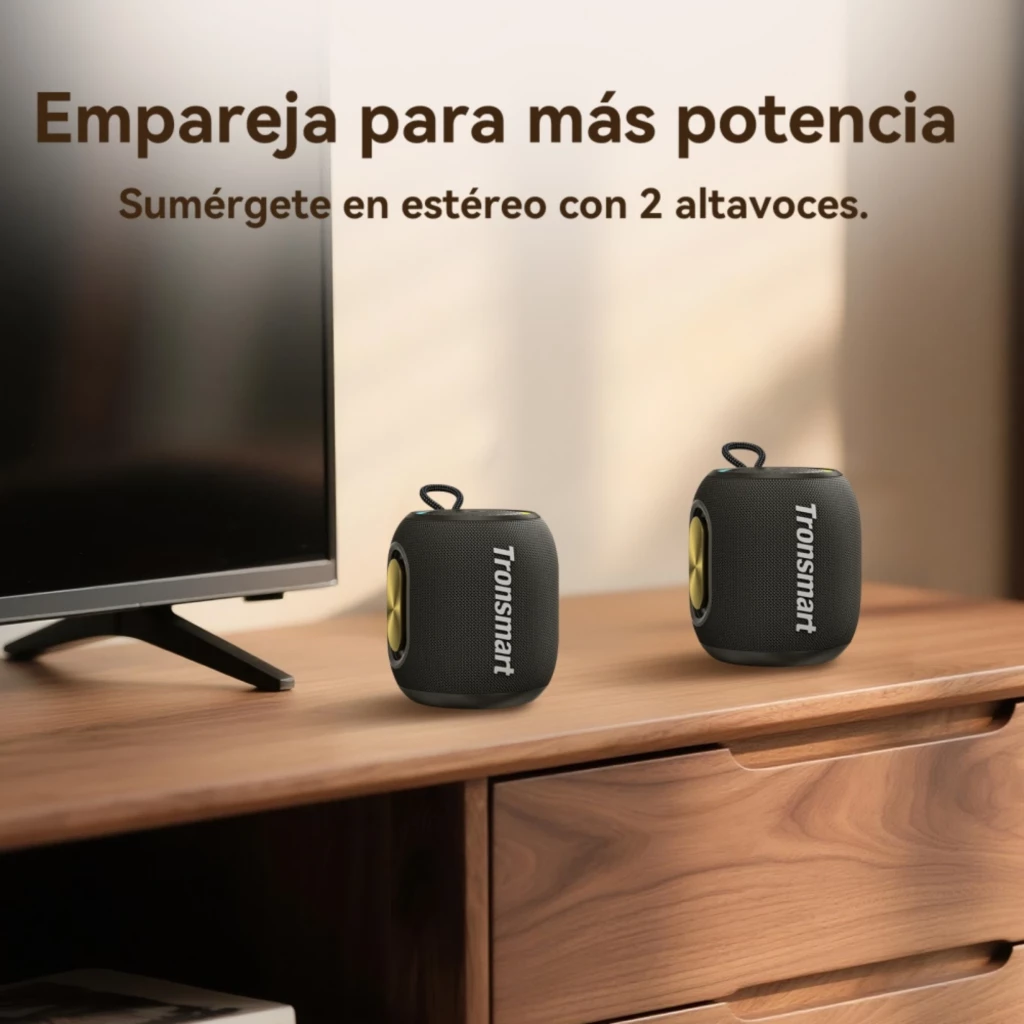 Tronsmart T8 Mini 16W IPX7 Negro, altavoz portátil compacto con diseño cilíndrico, radiadores laterales dorados, correa de agarre y opción de